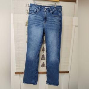 Levi’s 725 High Rise Bootcut Jeans in Medium Wash - Size 31